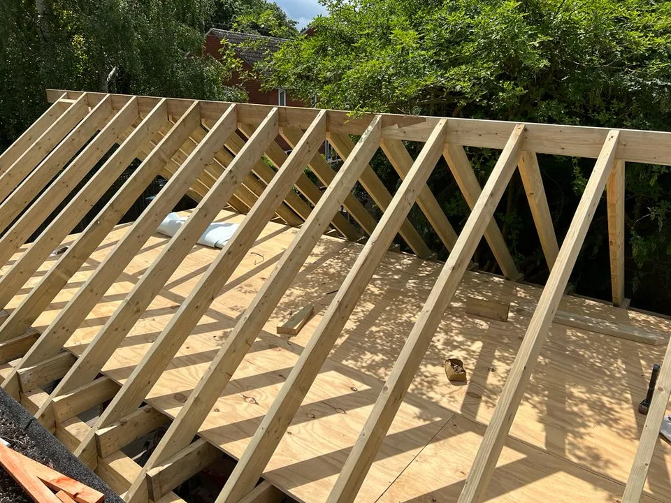 Close-up of structural timber and roof connections